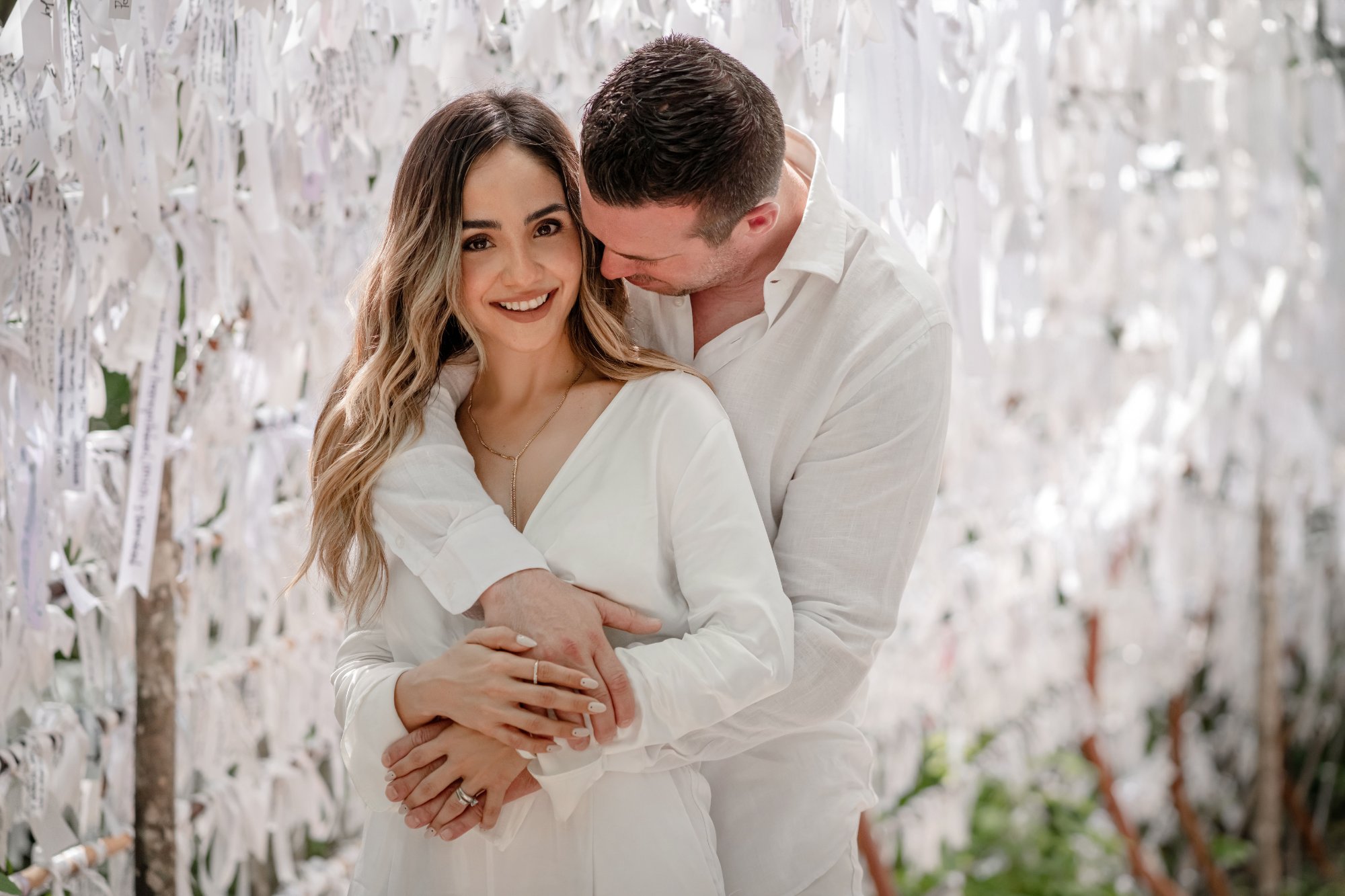 Documentary-style couple photography in Cancún — observed candid moment, neutral grading