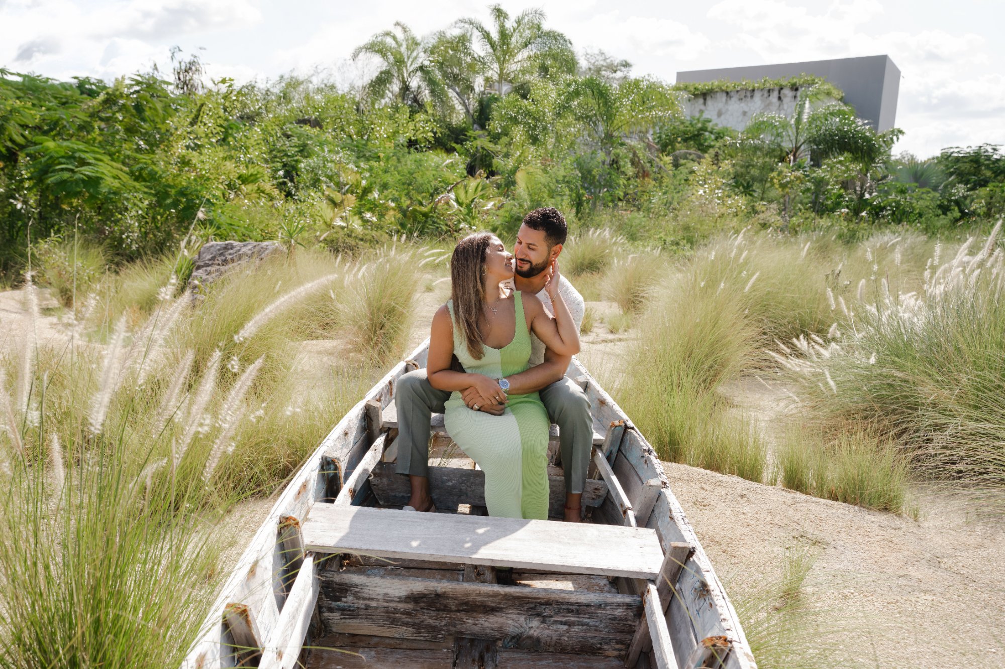 Vianey Díaz, founder of IVAE Studios, on location during a golden hour resort session in Cancún