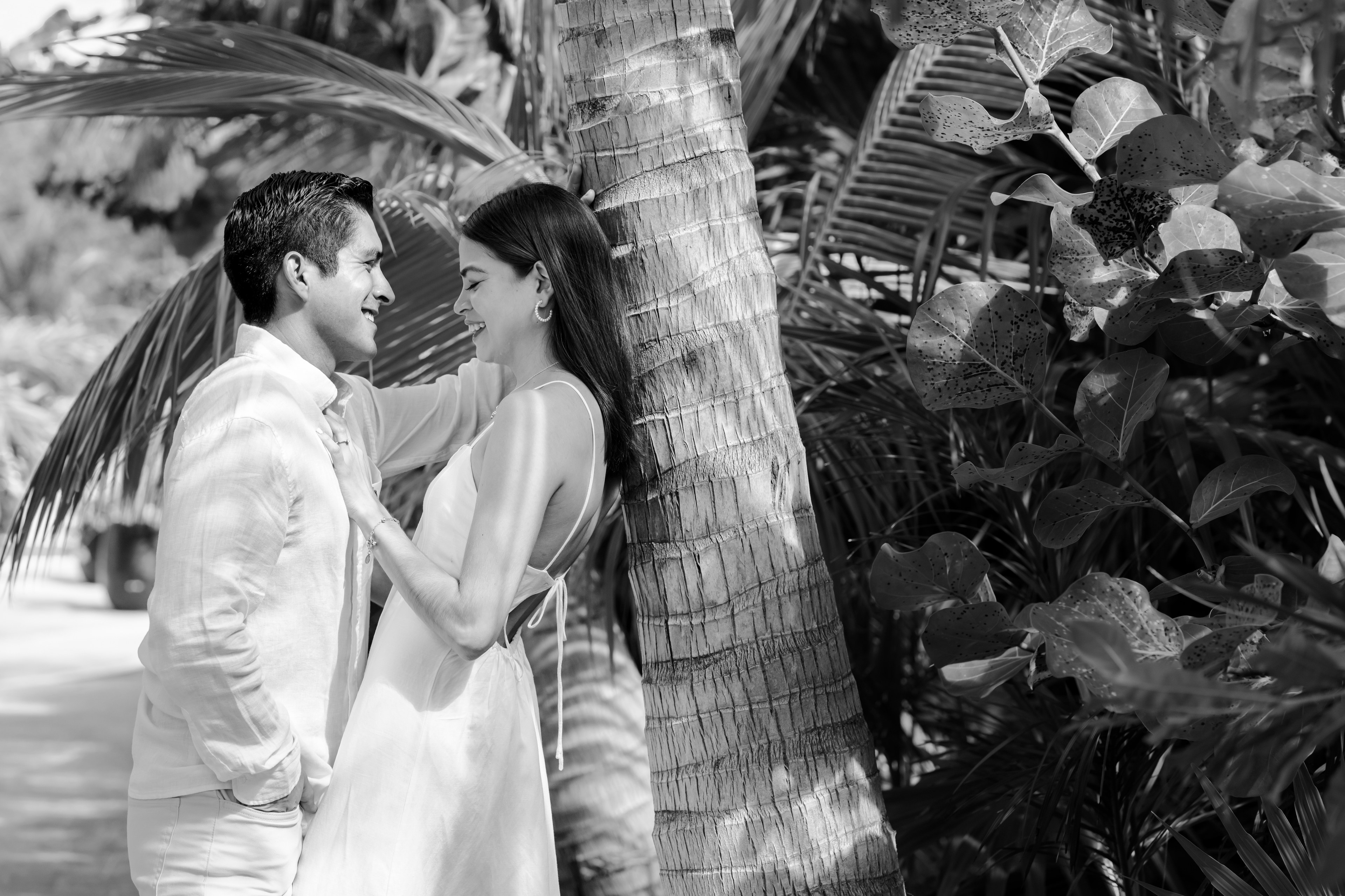 Couple at Isla Mujeres with Caribbean blue water by IVAE Studios