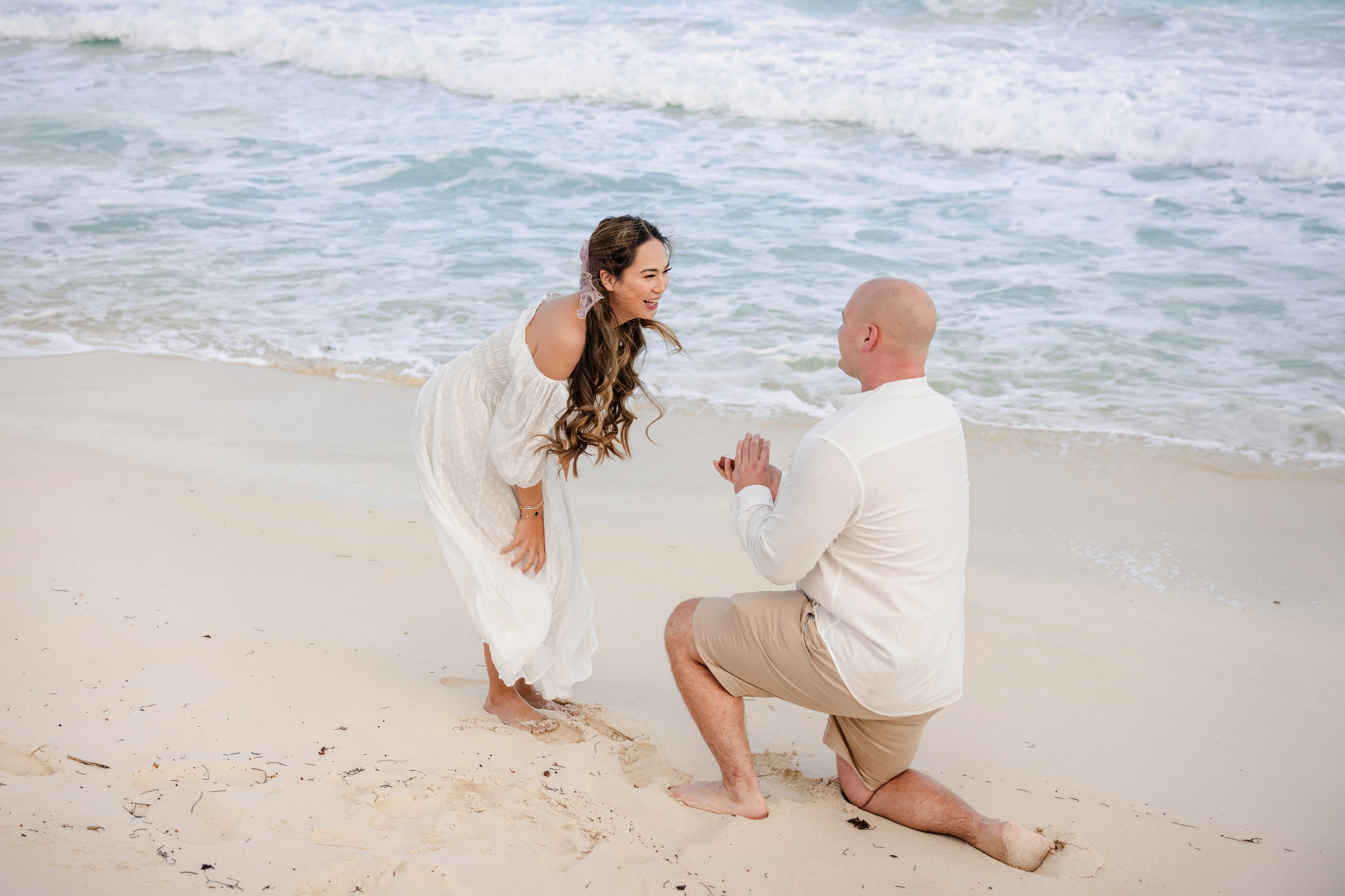 Couple photo session at the Tulum archaeological zone overlooking the Caribbean Sea
