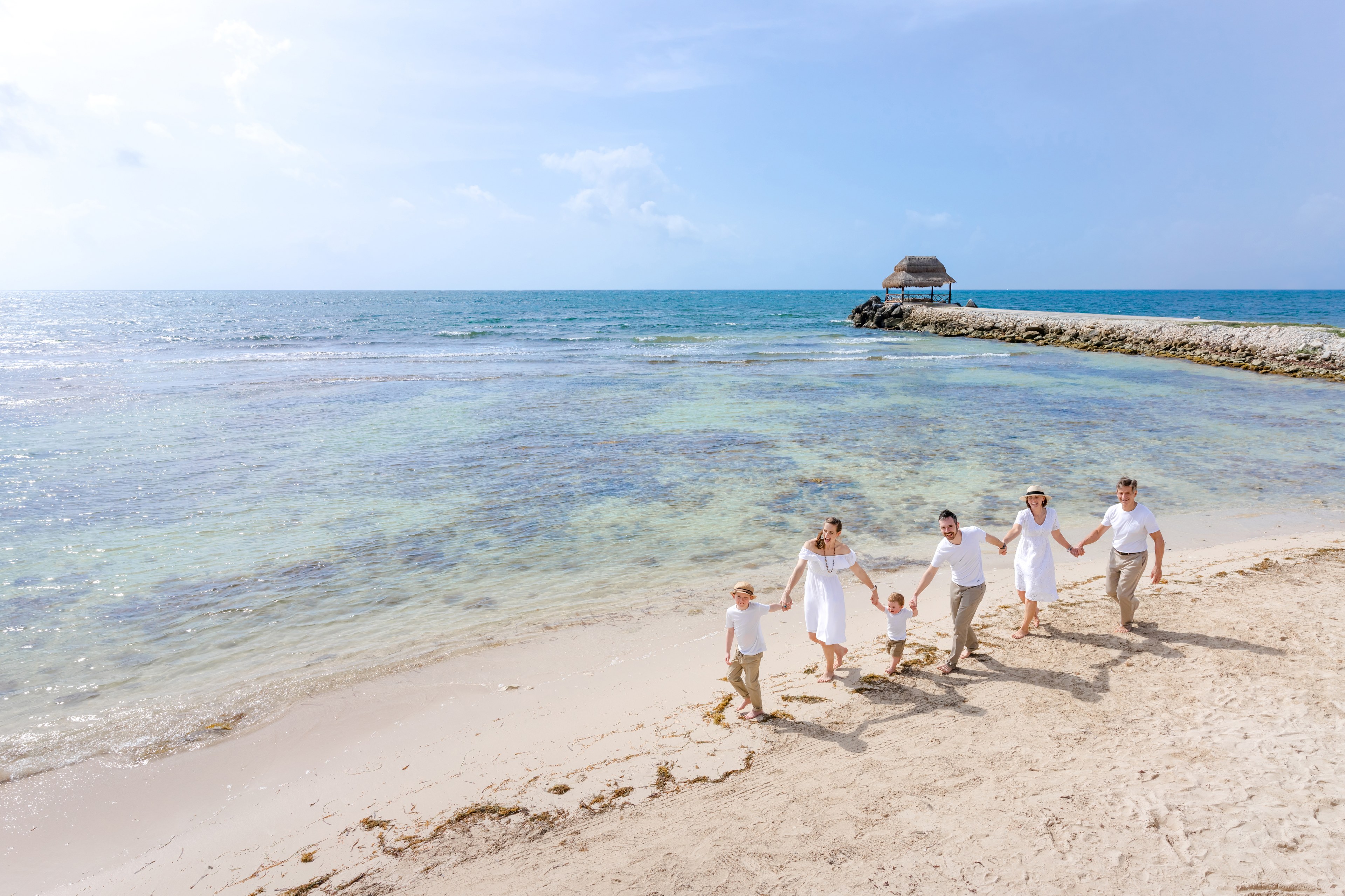 Family with kids Cancún beach wedding formals IVAE Studios