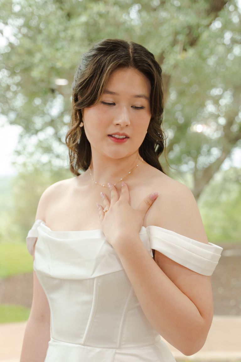 Kailyn, the bride, on her wedding day in May 2026, photographed by IVAE Studios