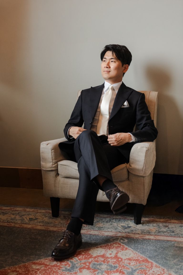 Ji waiting in the armchair