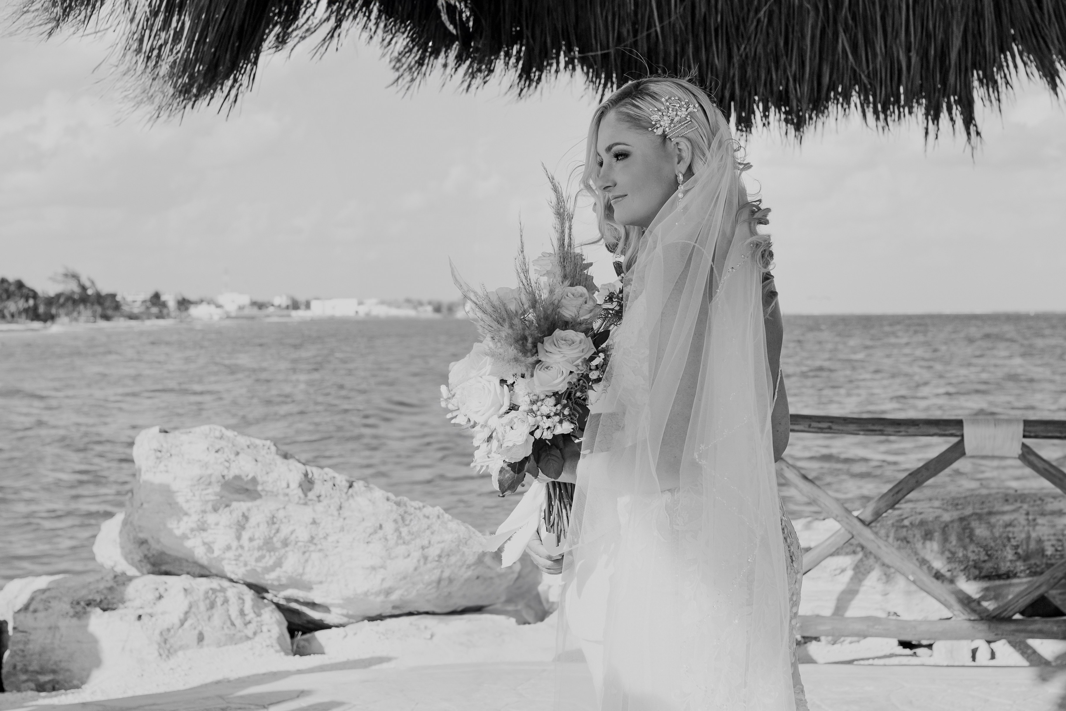 Bride at Cancún beachfront wedding ceremony — IVAE Studios destination wedding photographer