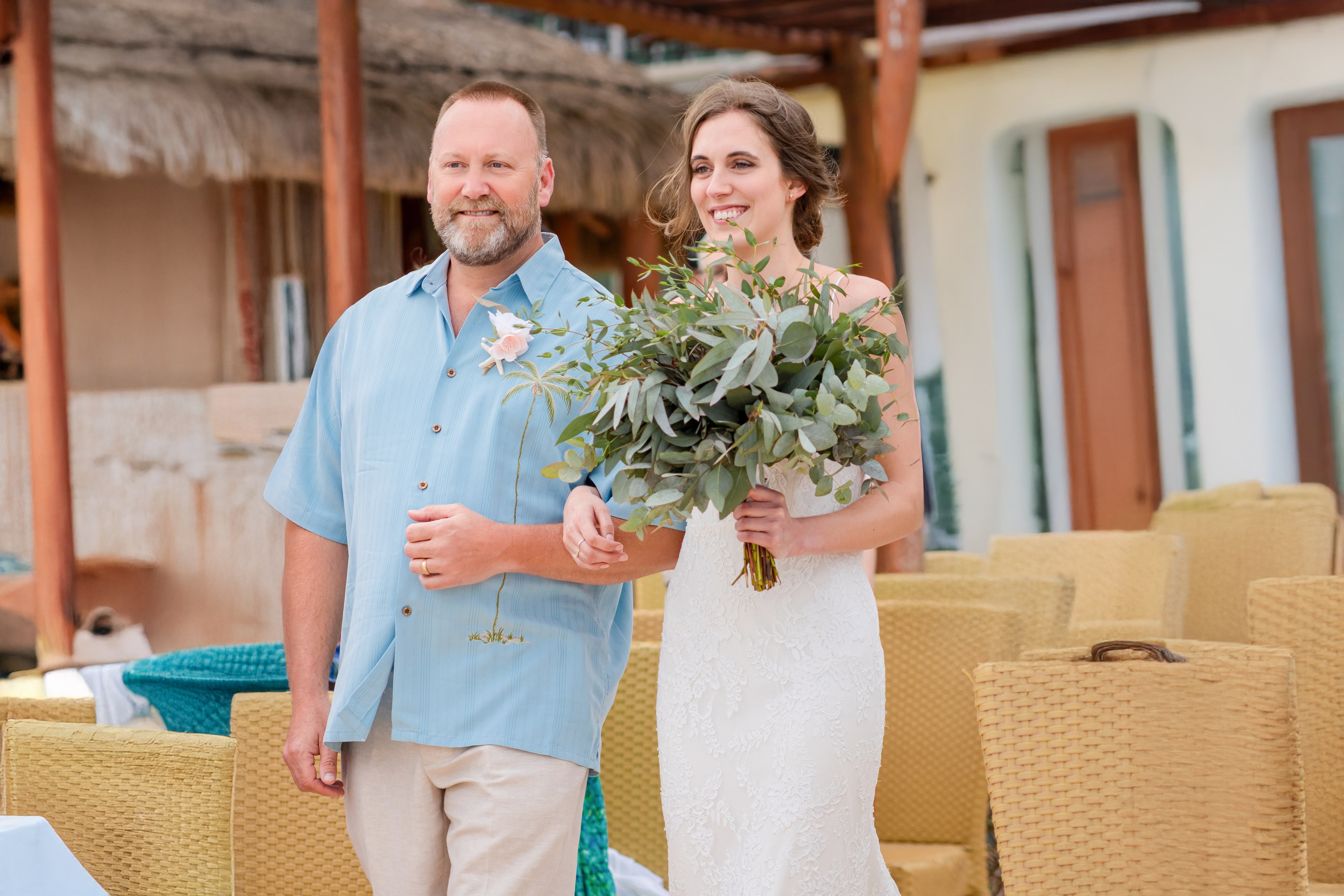 Bride at luxury Cancun all-inclusive resort showing the difference between in-house resort photography and an outside editorial photographer — IVAE Studios