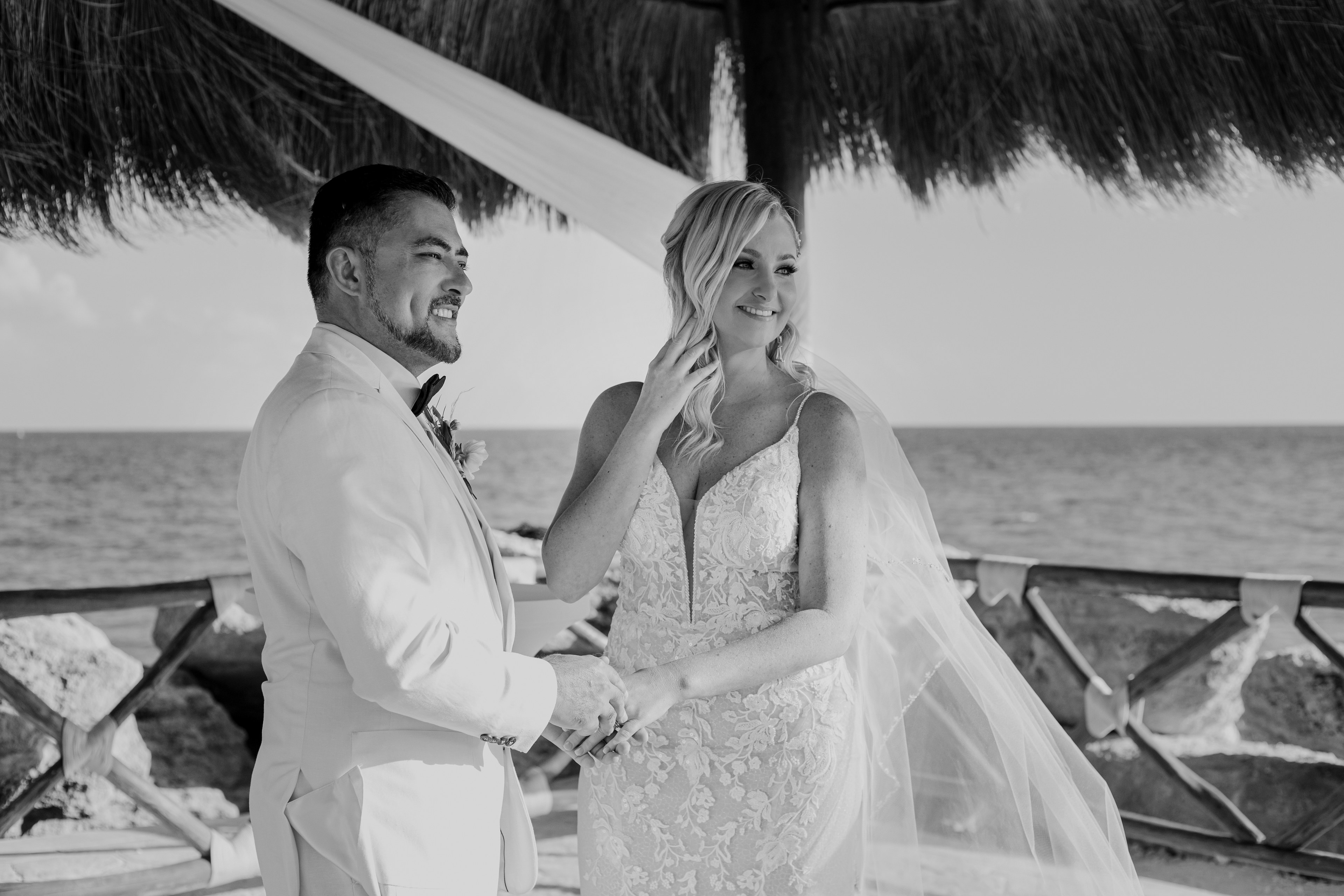 Wedding ceremony ring exchange Cancún resort IVAE Studios sample wedding photo