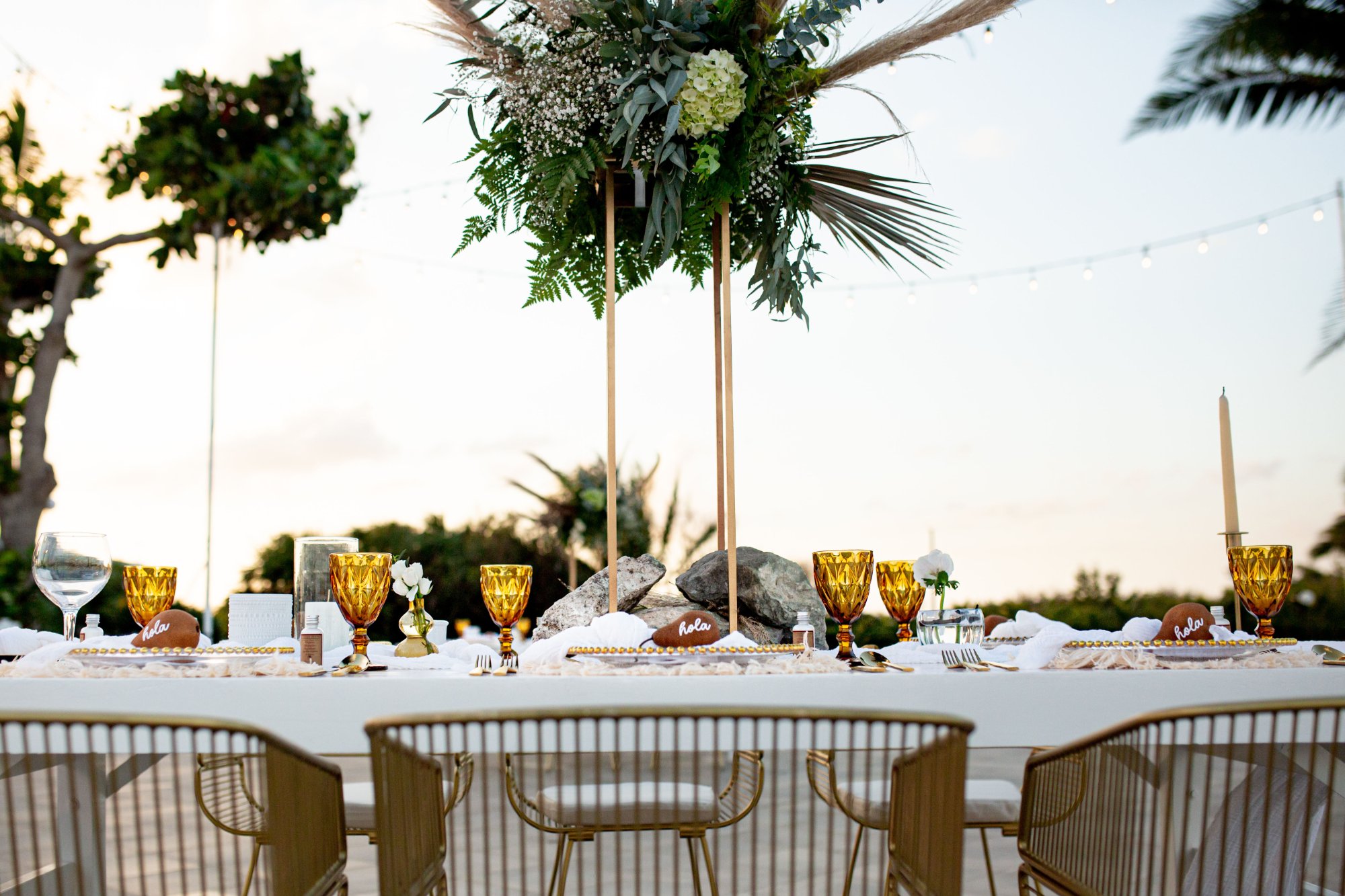Wedding reception decor and florals at premium Cancún hotel zone resort — IVAE Studios