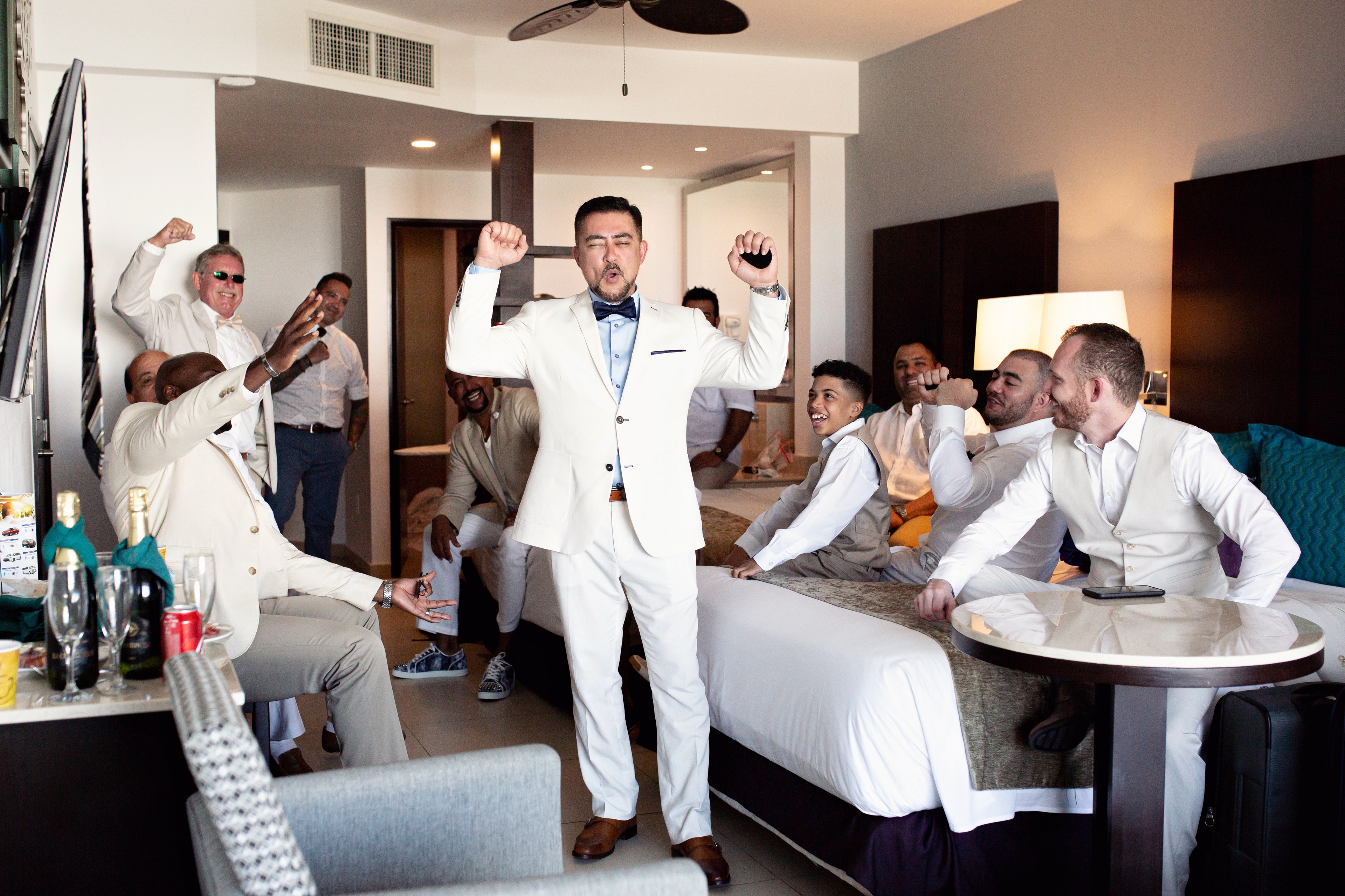 Groom and groomsmen dance floor Cancún IVAE Studios sample wedding photo