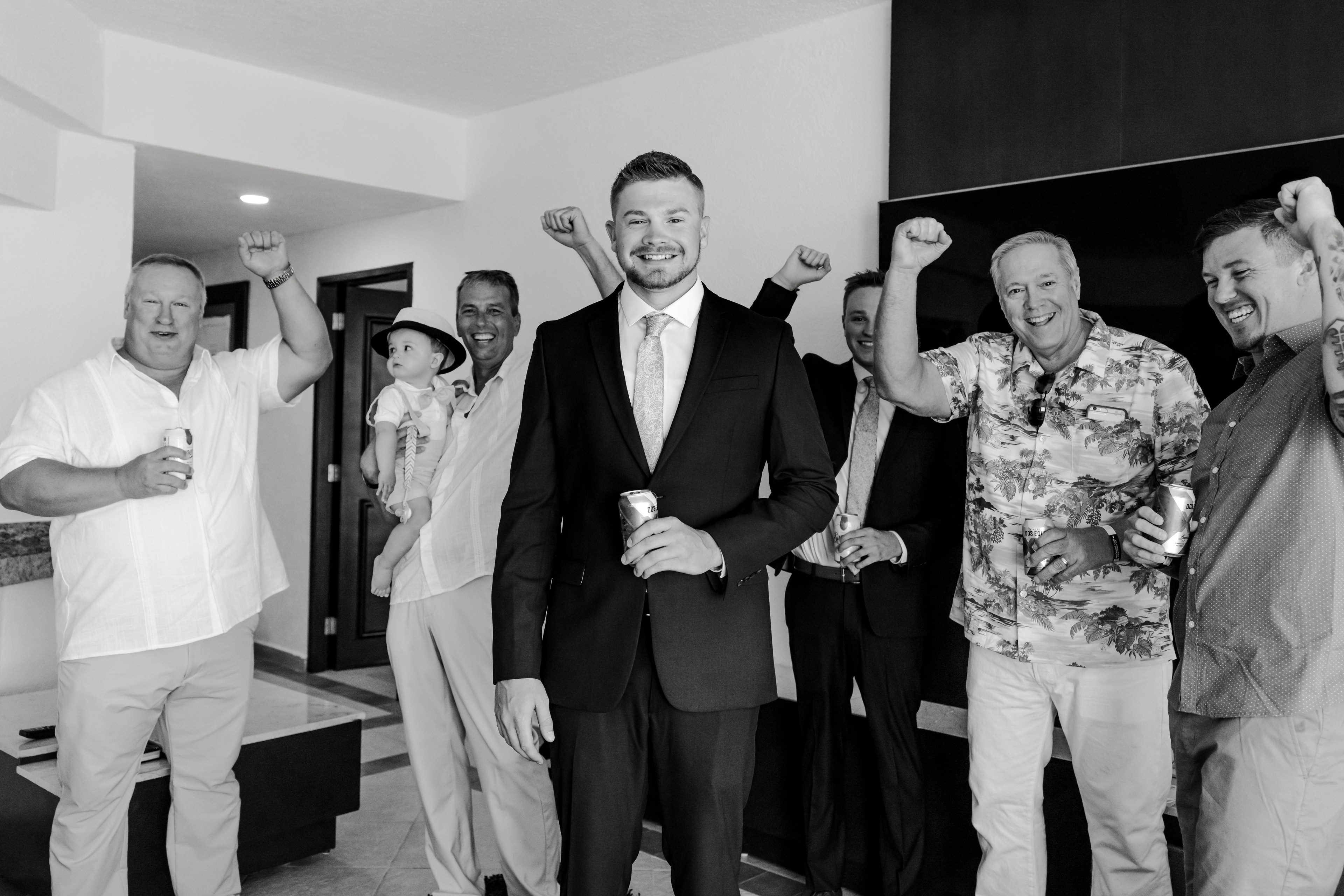 Groom with bride dancing reception Cancún IVAE Studios wedding photography Mexico
