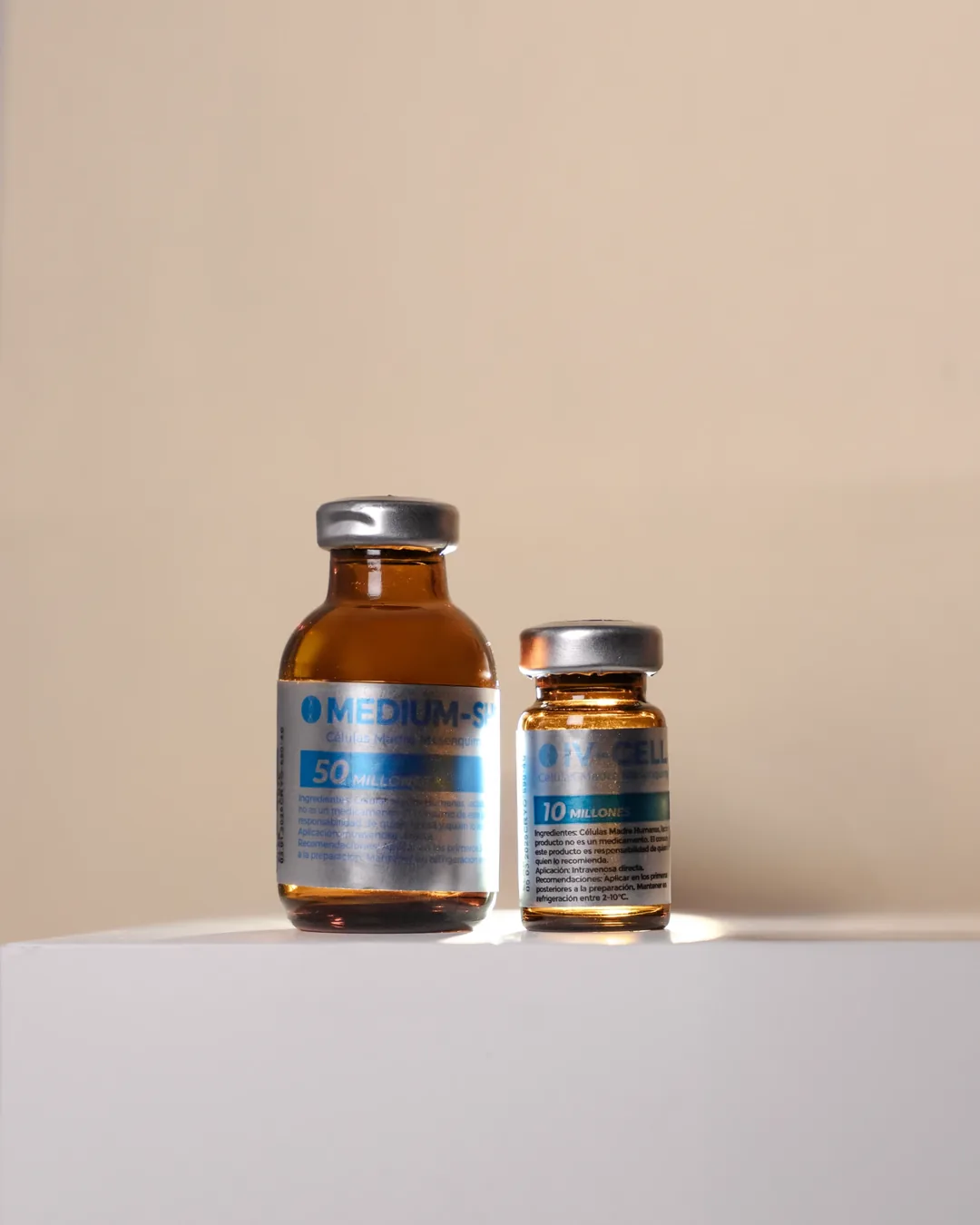 Regeneris Therapy treatment vials on a sand backdrop, product photography by IVAE