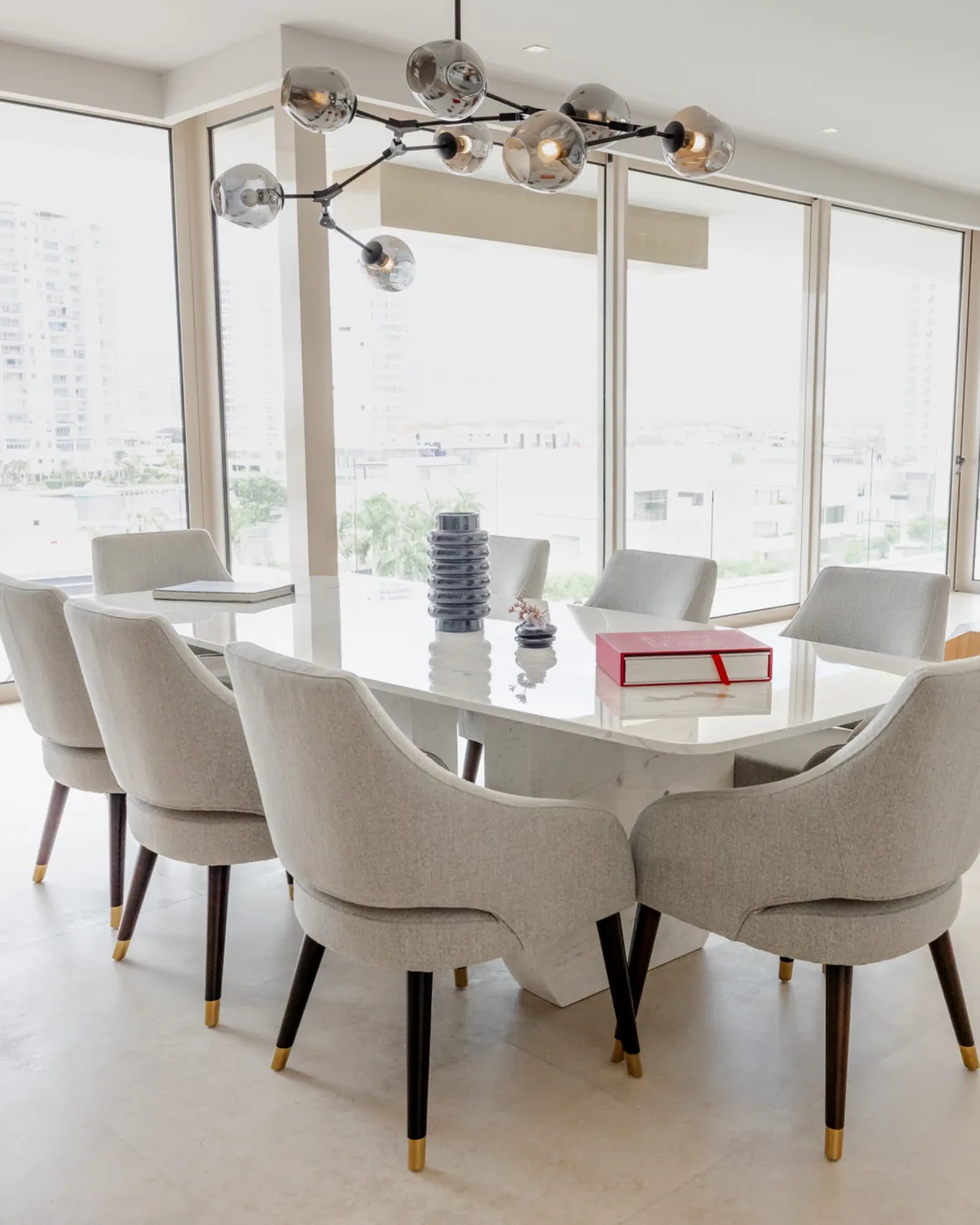 Dining room with city views in a residential project in Cancun, photographed by IVAE